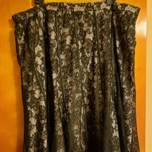 Beige and black lace skirt.